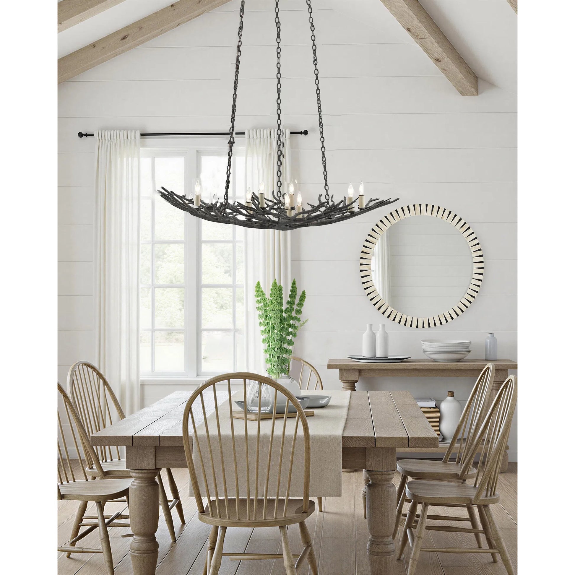 Rainforest Chandelier by Currey and Company in rustic bronze. Made from unique in a rustic style.