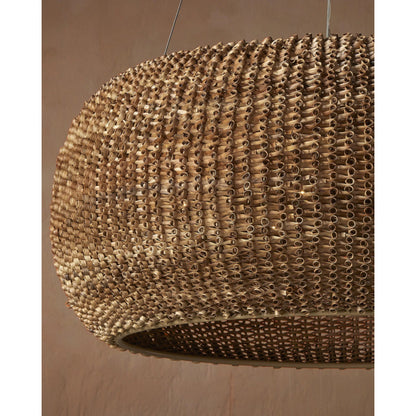 Boucle Chandelier by Currey and Company in natural, beige. Made from rattan, wrought iron in a rustic style.