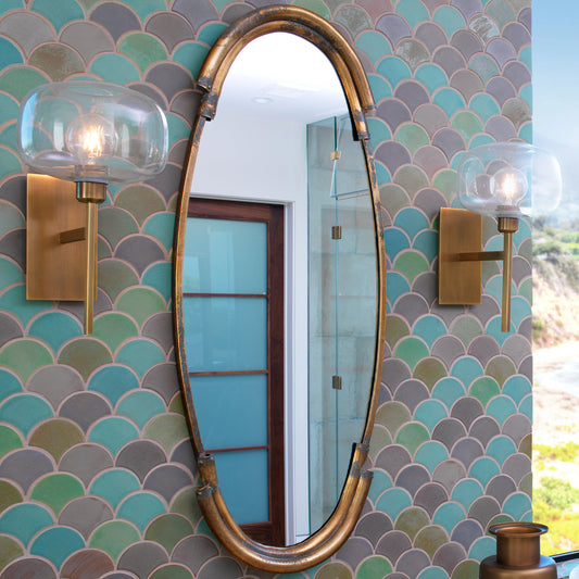 Scando Mod Sconce by Jamie Young in antique brass clear glass. Made from steel, glass in a transitional style.