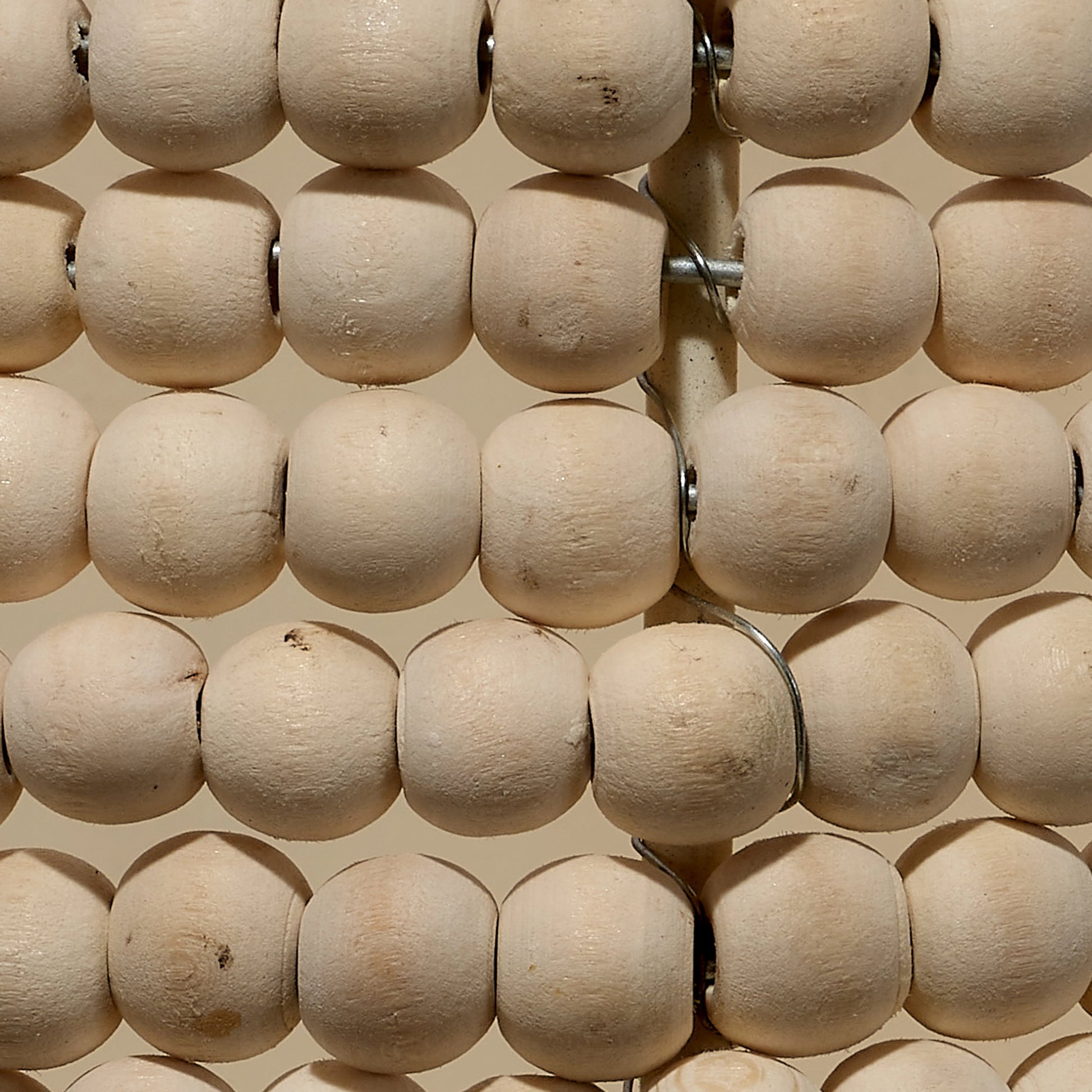 Seawall Beaded Cone Sconce by Jamie Young. Made from iron, mango wood in a coastal style.