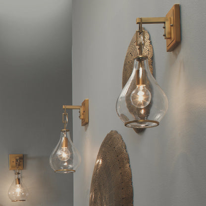 Tear Drop Hanging Wall Sconce by Jamie Young in clear glass, antique brass. Made from iron, glass in a transitional style.
