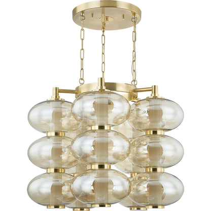 Toulouse Chandelier by Corbett in vintage brass. Made from brass in a modern style.