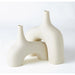 Stretch Vase by Global Views. Made from earthenware in a eclectic & global style.