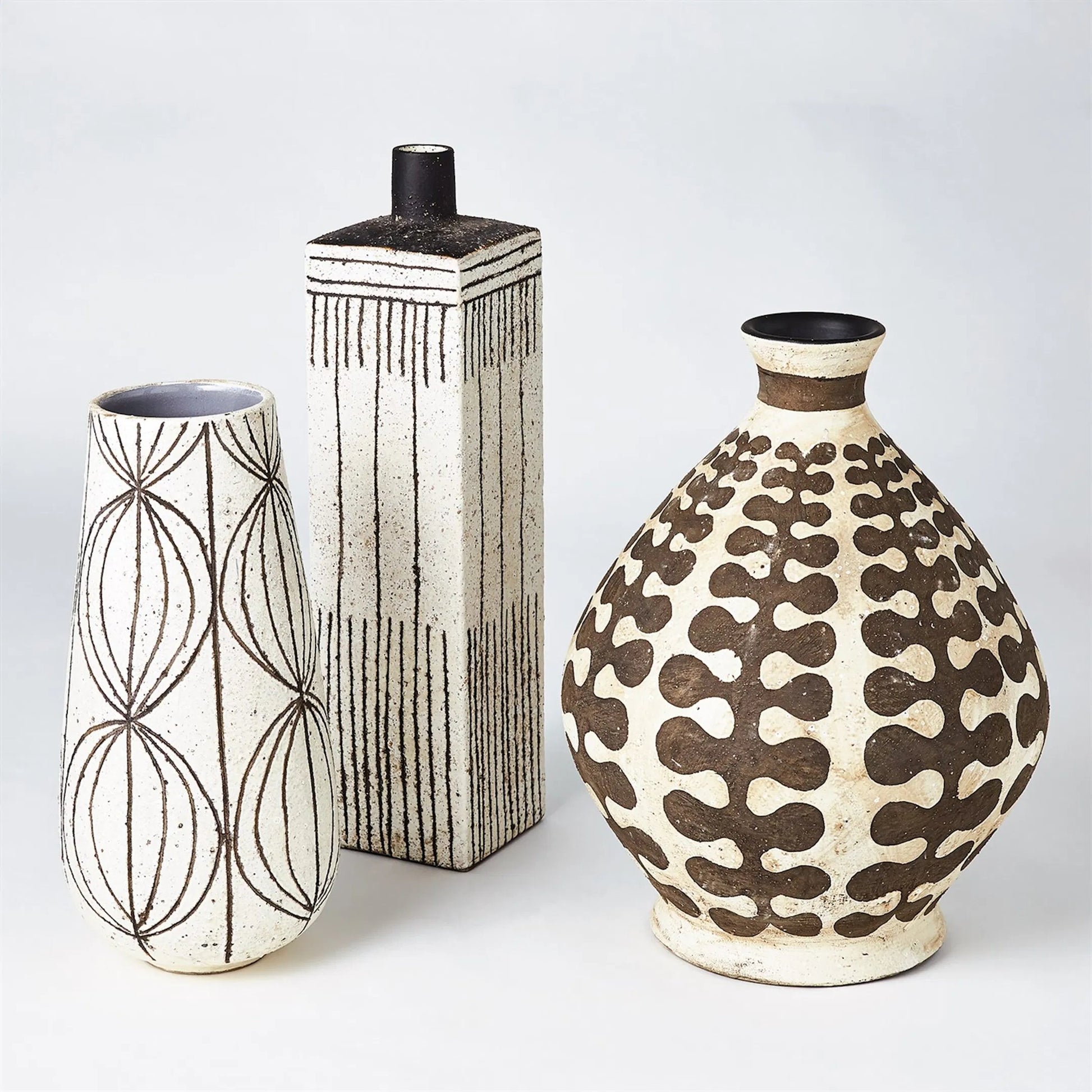 Graffiti Square Vase by Global Views. Made from earthenware in a eclectic & global style.