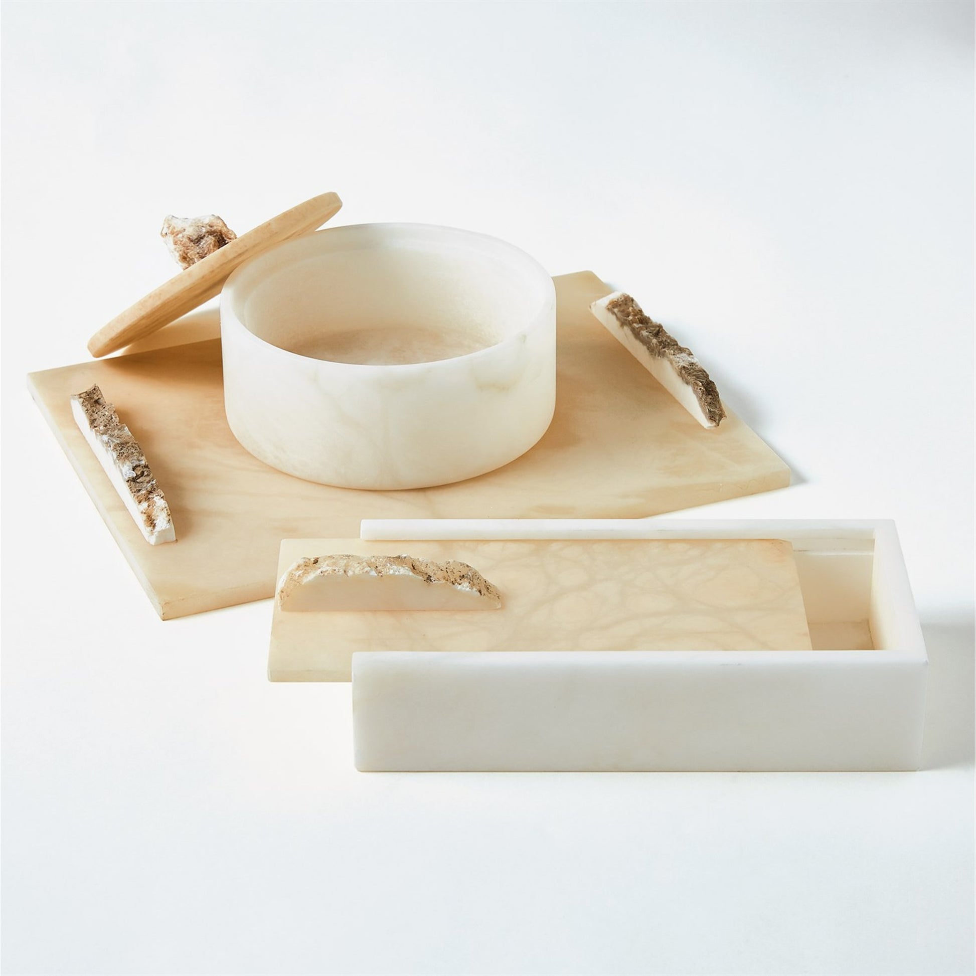 Alabaster Round Box with Rock Finial by Global Views. Made from alabaster in a coastal style.
