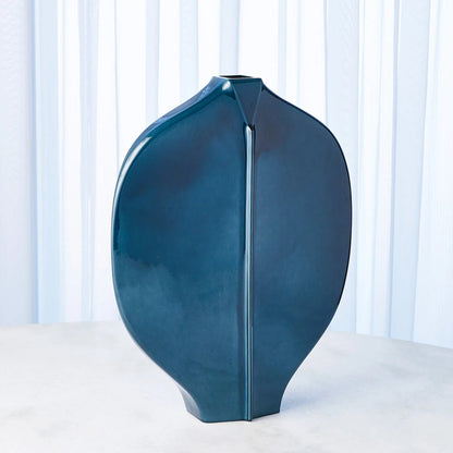 Center Ridge Vase by Global Views in blue. Made from earthenware-reactive glaze in a modern style.