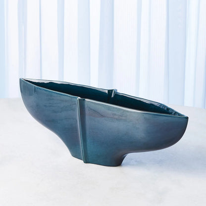 Center Ridge Bowl by Global Views in blue. Made from earthenware-reactive glaze in a modern style.