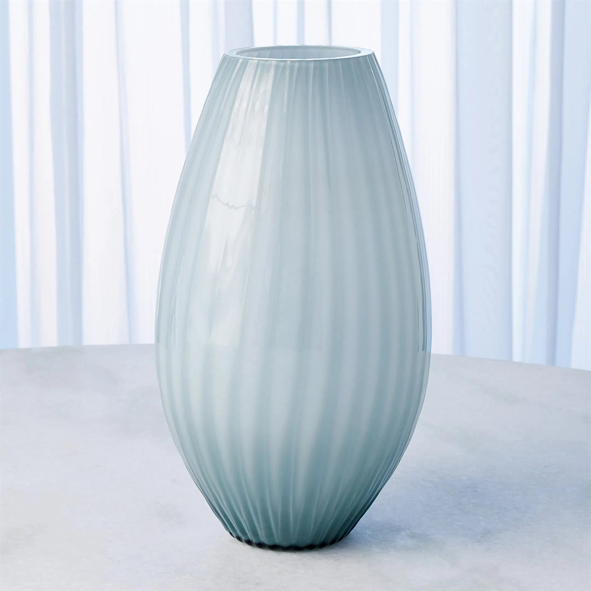 Cased Glass Stripe Vase by Global Views in blue. Made from unique in a modern style.
