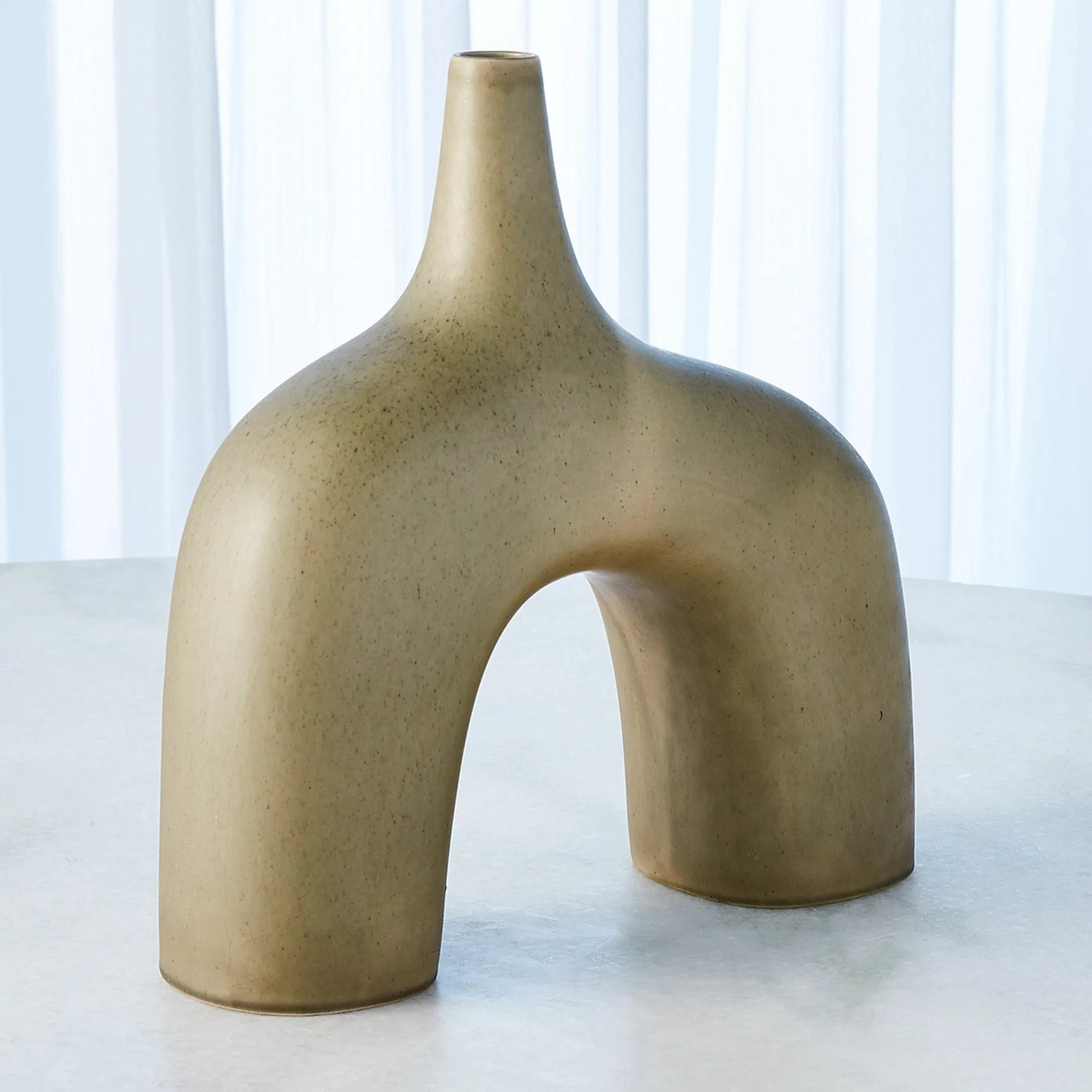 Stretch Vase by Global Views. Made from earthenware in a eclectic & global style.