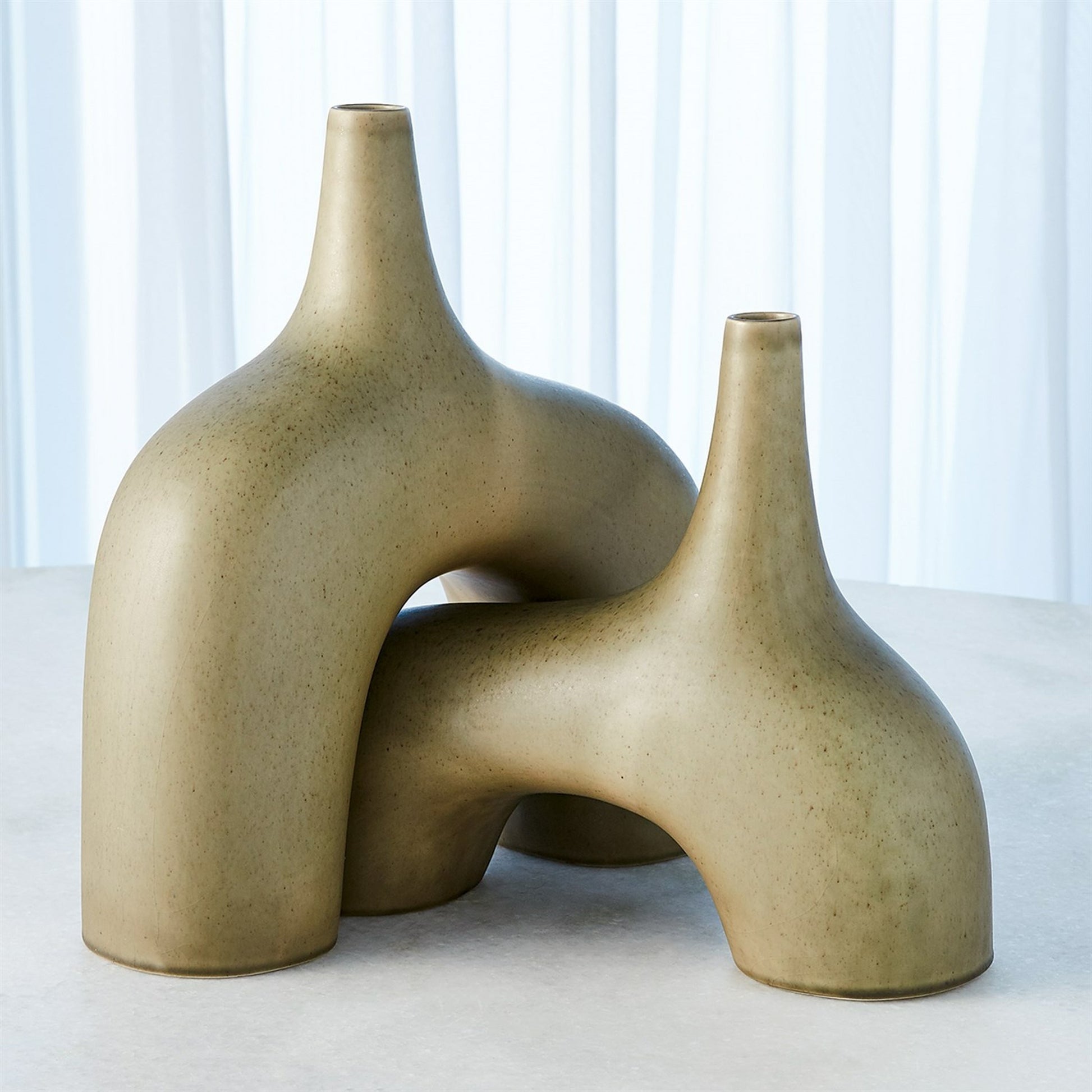 Stretch Vase by Global Views. Made from earthenware in a eclectic & global style.