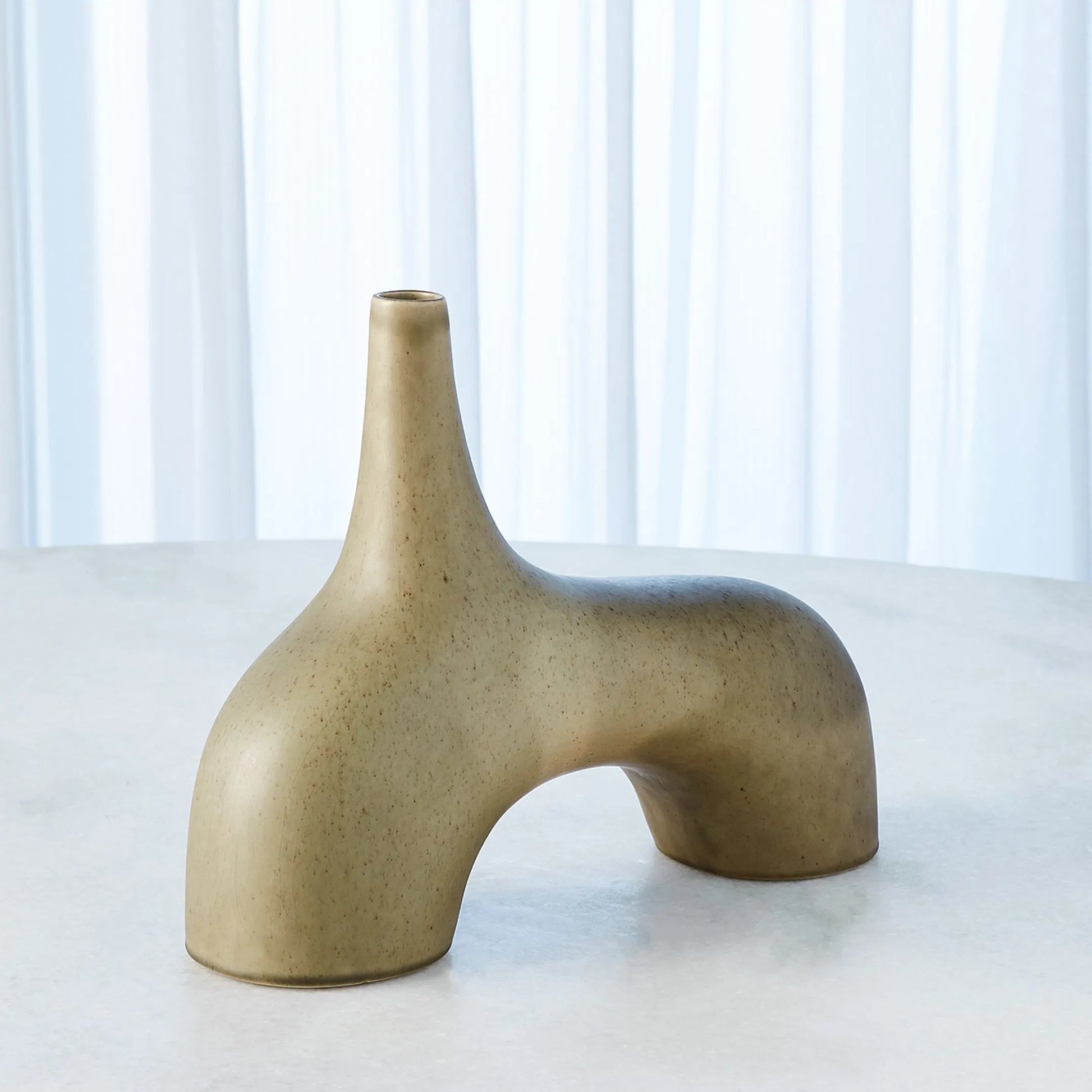 Stretch Vase by Global Views. Made from earthenware in a eclectic & global style.