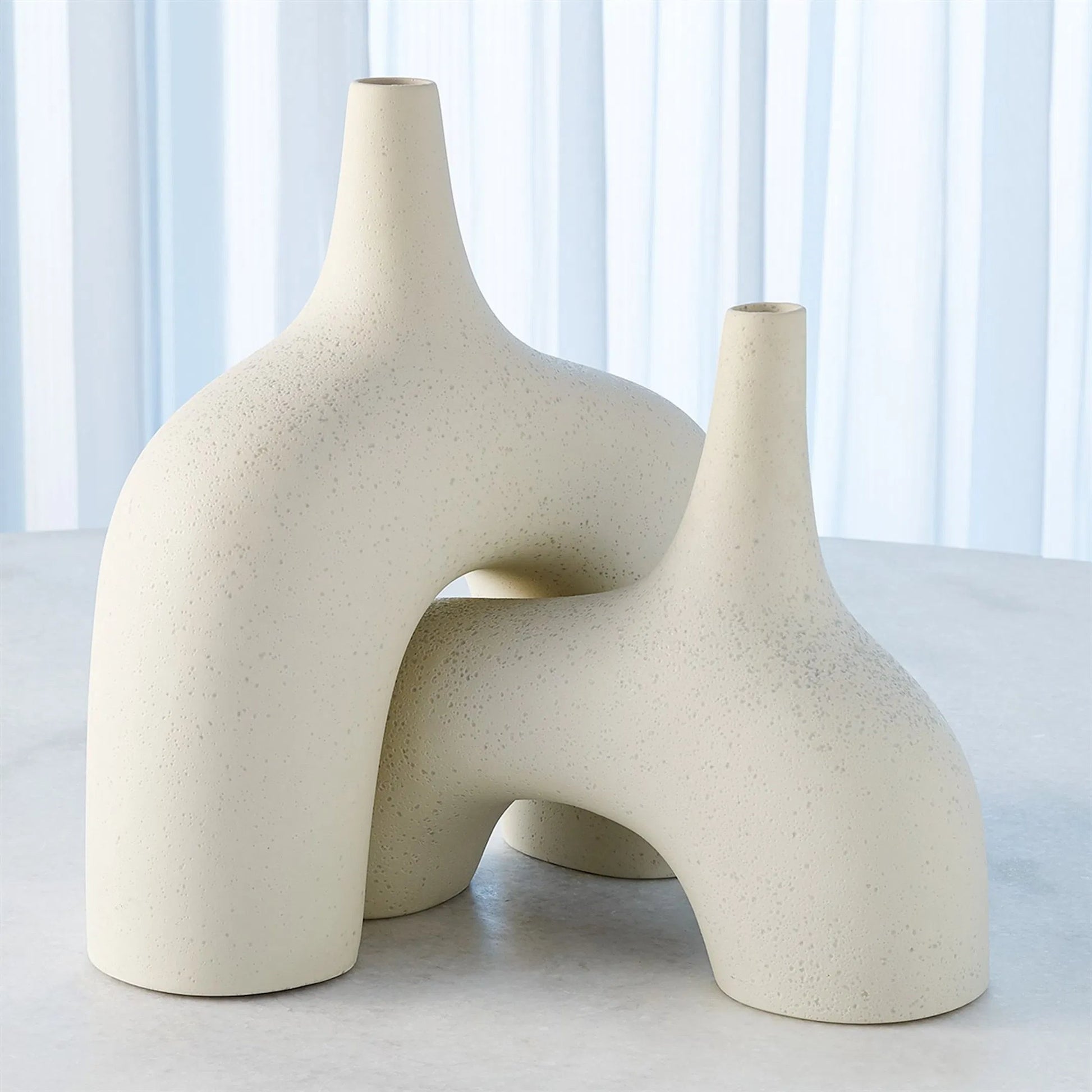Stretch Vase by Global Views. Made from earthenware in a eclectic & global style.