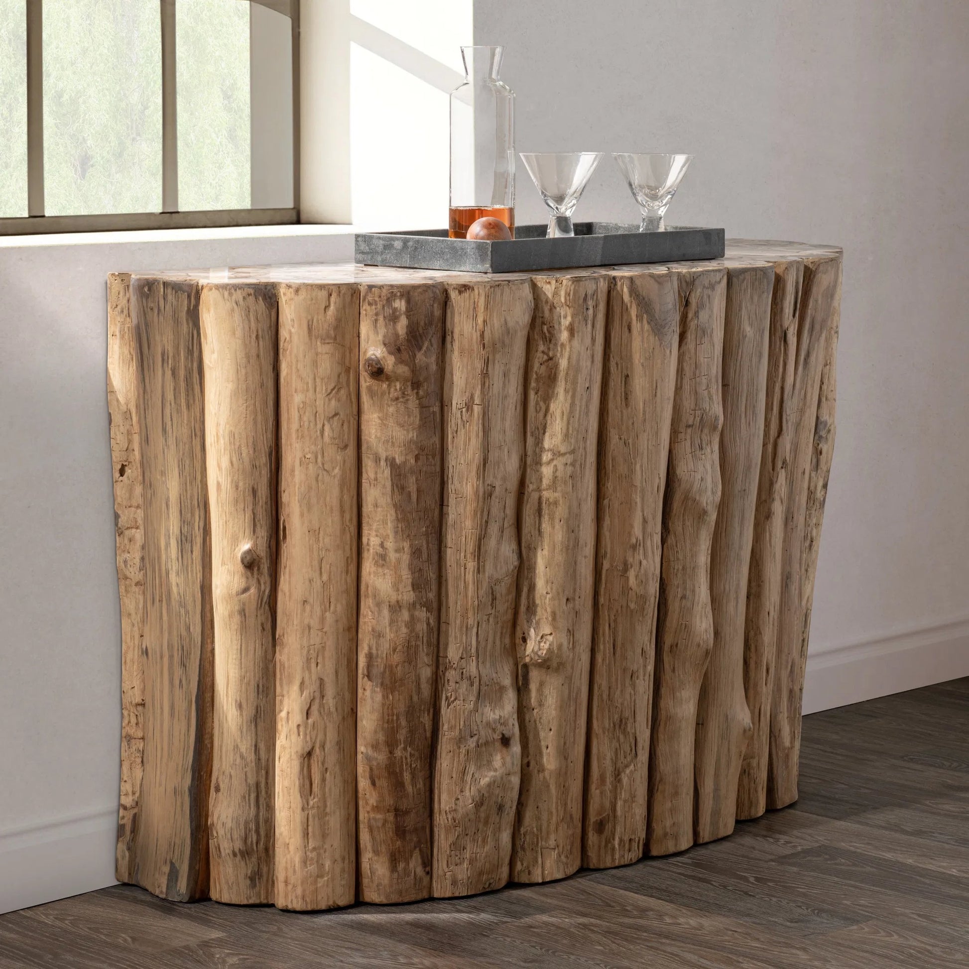 Norwest Petrified Teak Wood Console Table by Classic Home. Made from teak wood in a transitional style.