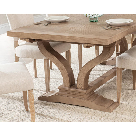 Alexander Extendable Reclaimed Pine Dining Table by Classic Home in natural distressed pine. Made from reclaimed pine in a transitional style.
