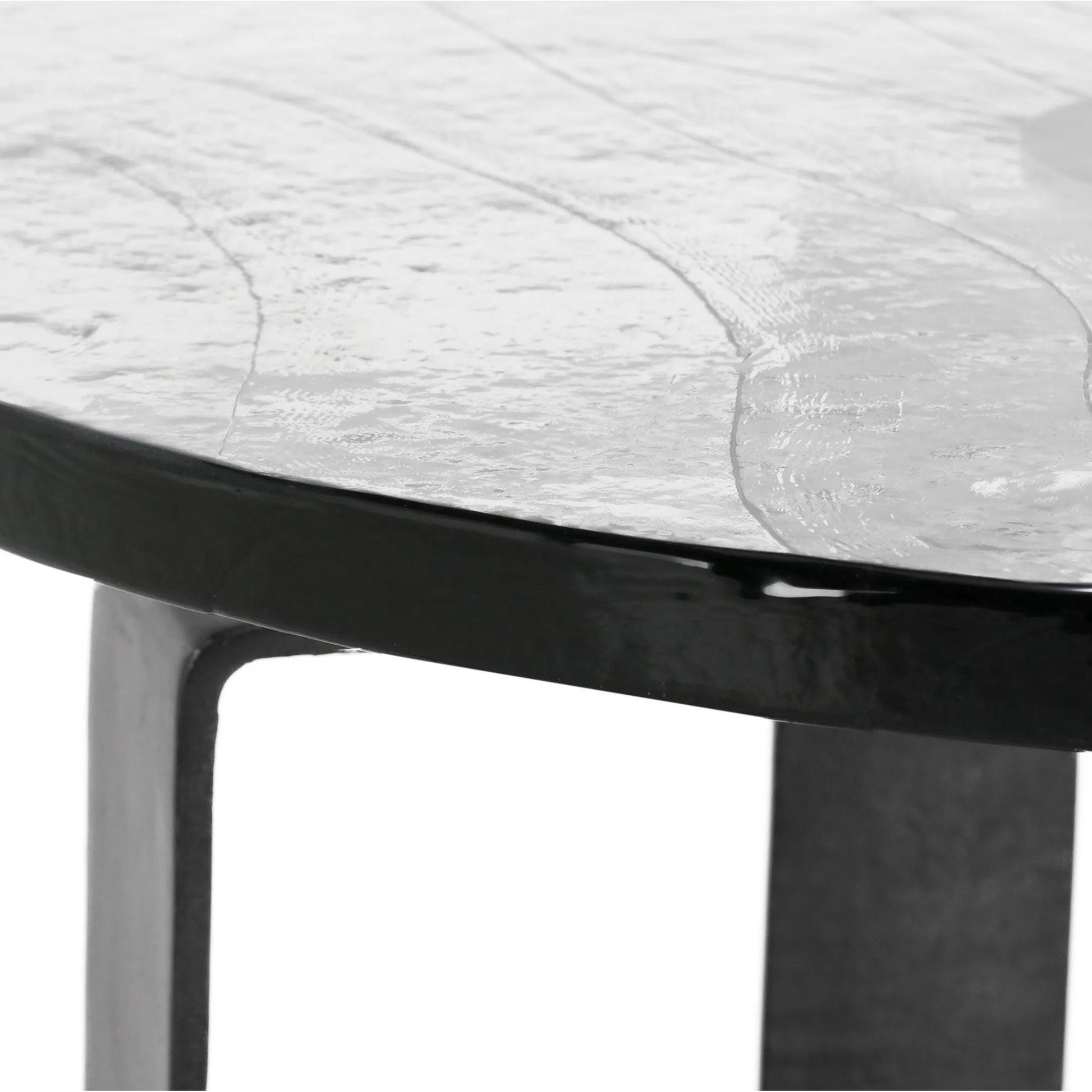 Keith 28" Industrial Glass Black Coffee Table by Classic Home in black. Made from cast glass, iron in a modern style.