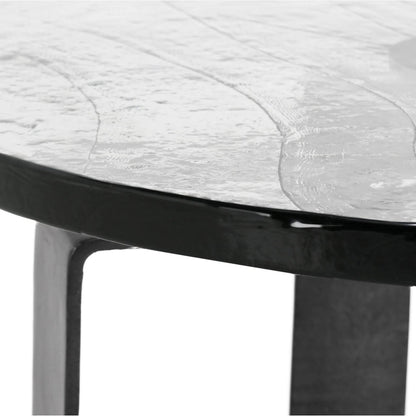 Keith 28" Industrial Glass Black Coffee Table by Classic Home in black. Made from cast glass, iron in a modern style.