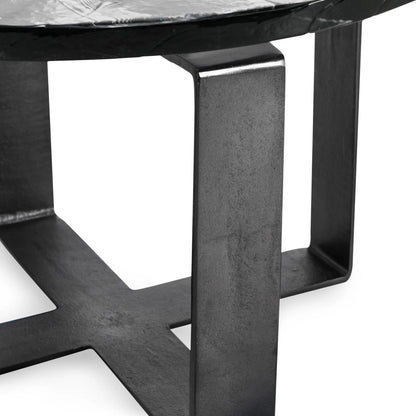 Keith 28" Industrial Glass Black Coffee Table by Classic Home in black. Made from cast glass, iron in a modern style.