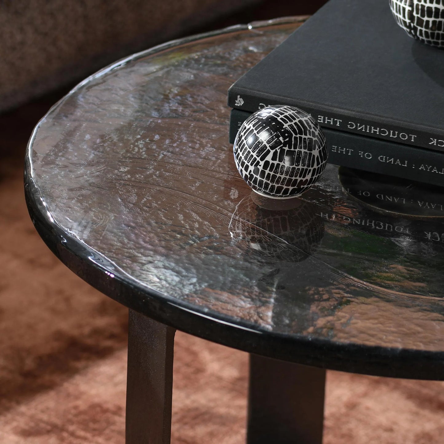 006 SI-2238799 | Closeup | Keith 28" Industrial Glass Black Coffee Table by Classic Home in black. Made from cast glass, iron in a modern style.