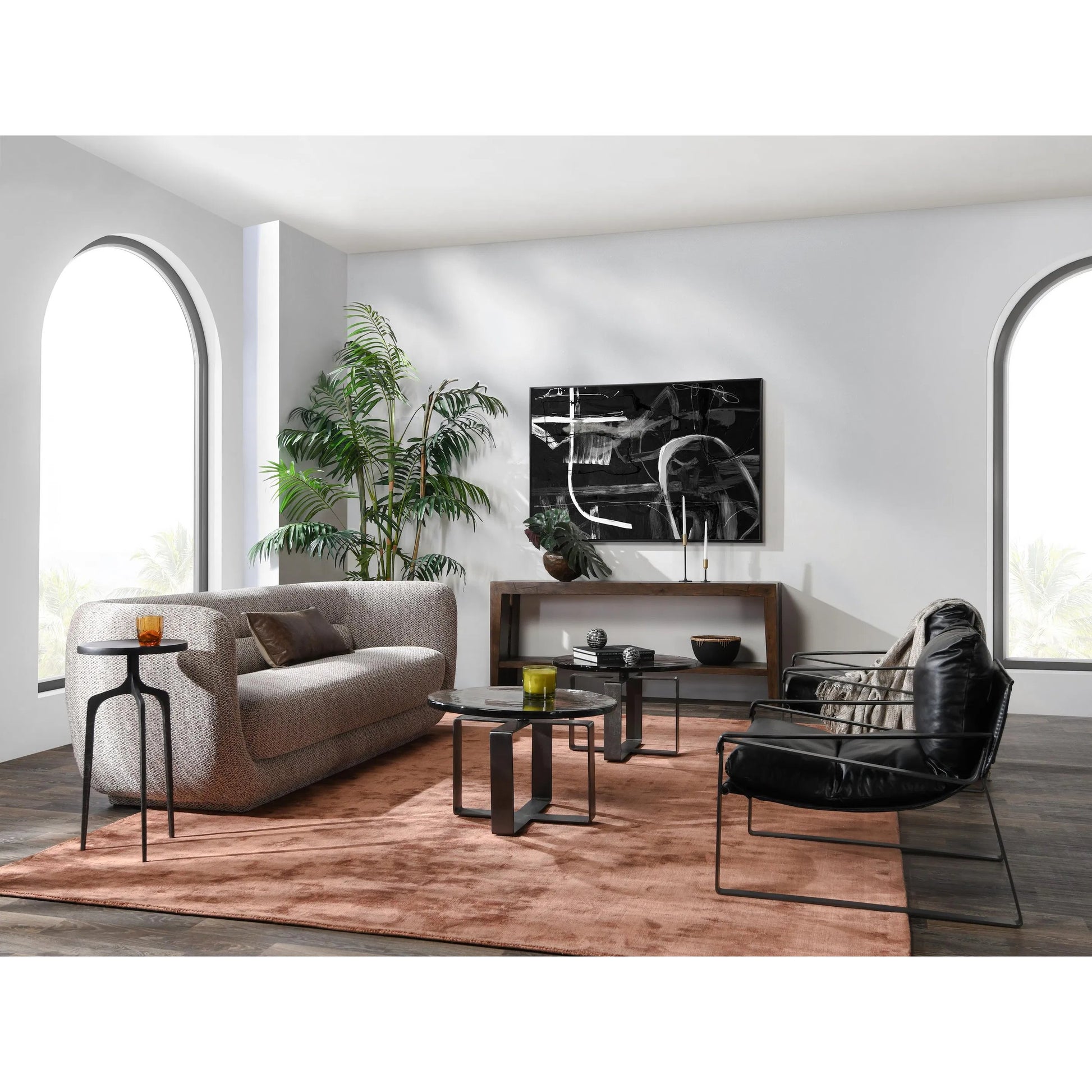 Keith 28" Industrial Glass Black Coffee Table by Classic Home in black. Made from cast glass, iron in a modern style.