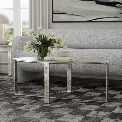 Flores 48" Oval Coffee Table by Classic Home in nickel. Made from cast aluminum in a unique style.