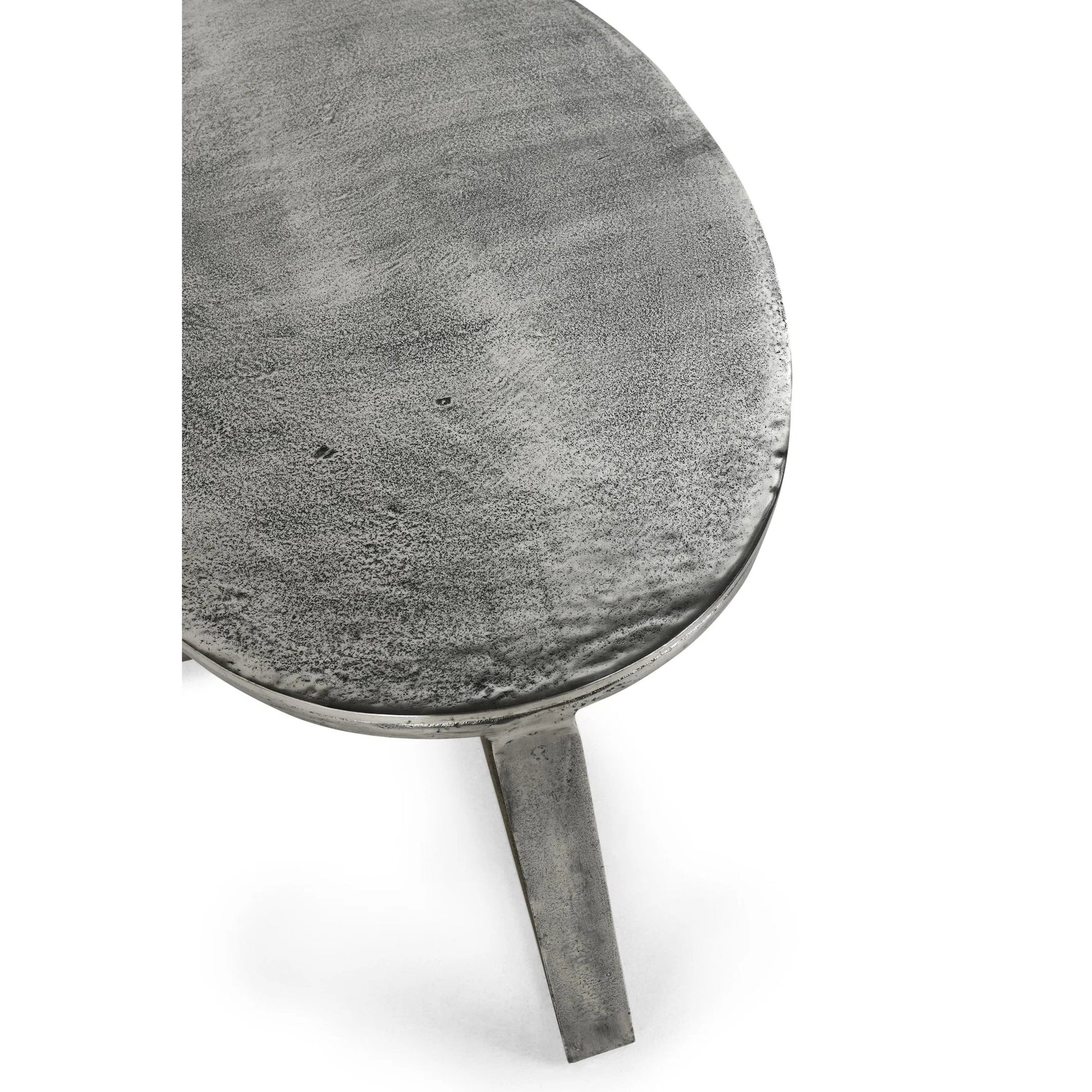 Flores 48" Oval Coffee Table by Classic Home in nickel. Made from cast aluminum in a unique style.