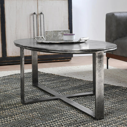 Flores 48" Oval Coffee Table by Classic Home in nickel. Made from cast aluminum in a unique style.