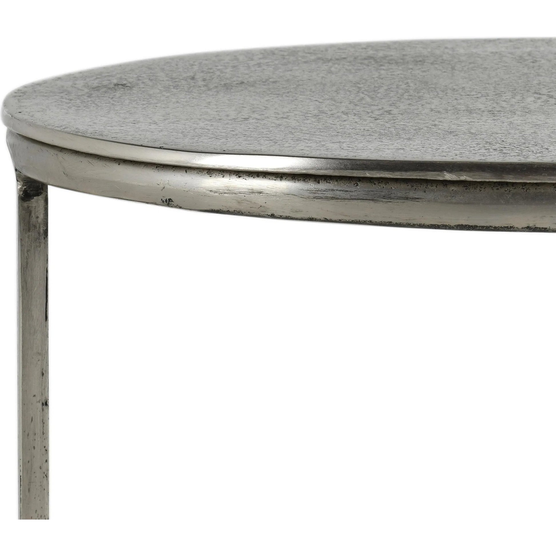 Flores 27" Oval End Table by Classic Home in nickel. Made from cast aluminum in a unique style.