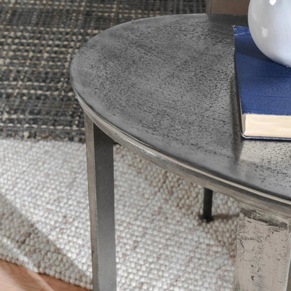 Flores 27" Oval End Table by Classic Home in nickel. Made from cast aluminum in a unique style.
