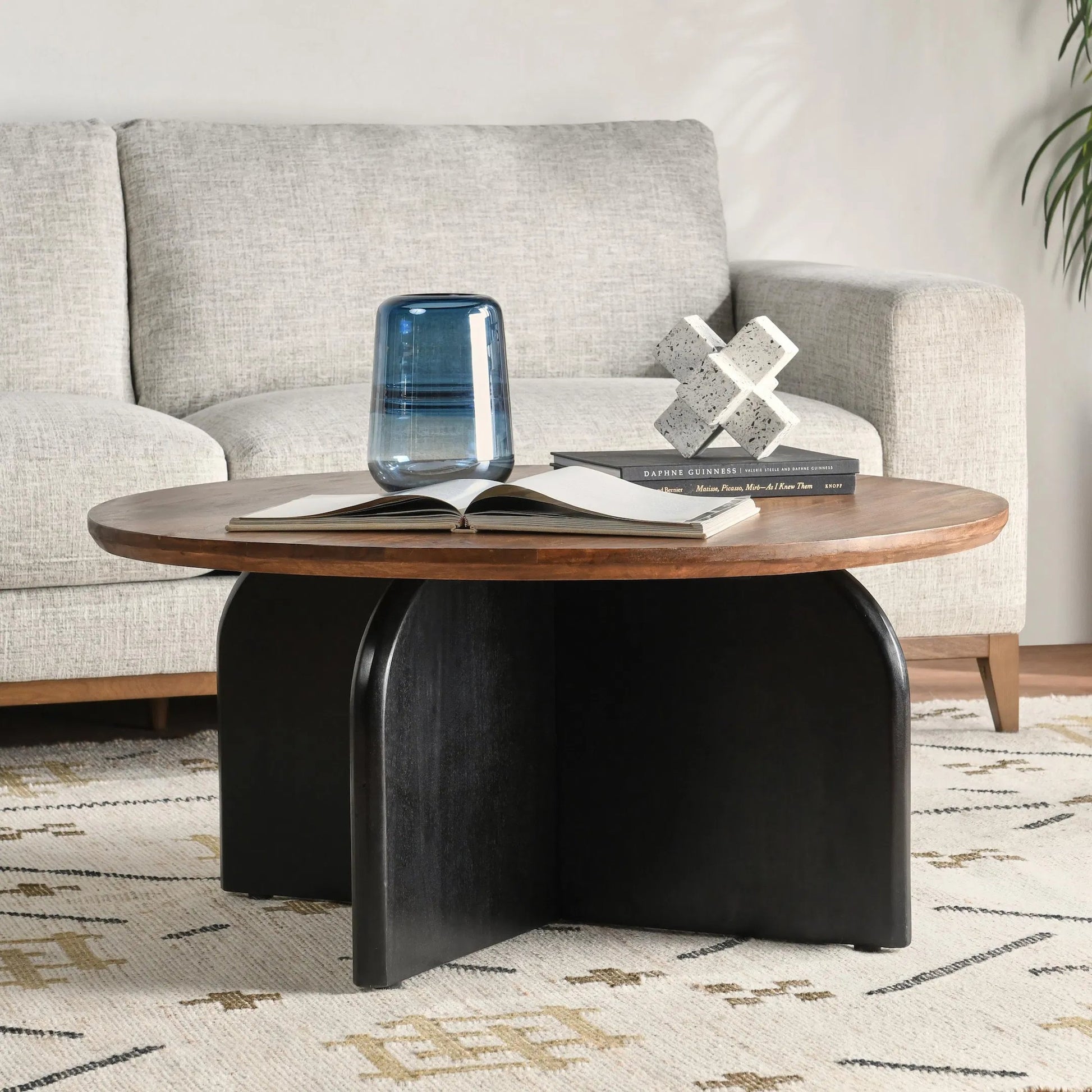 Penelope Mango Wood Two-Tone Coffee Table by Kosas Home in natural brown, black. Made from mango wood in a unique style.