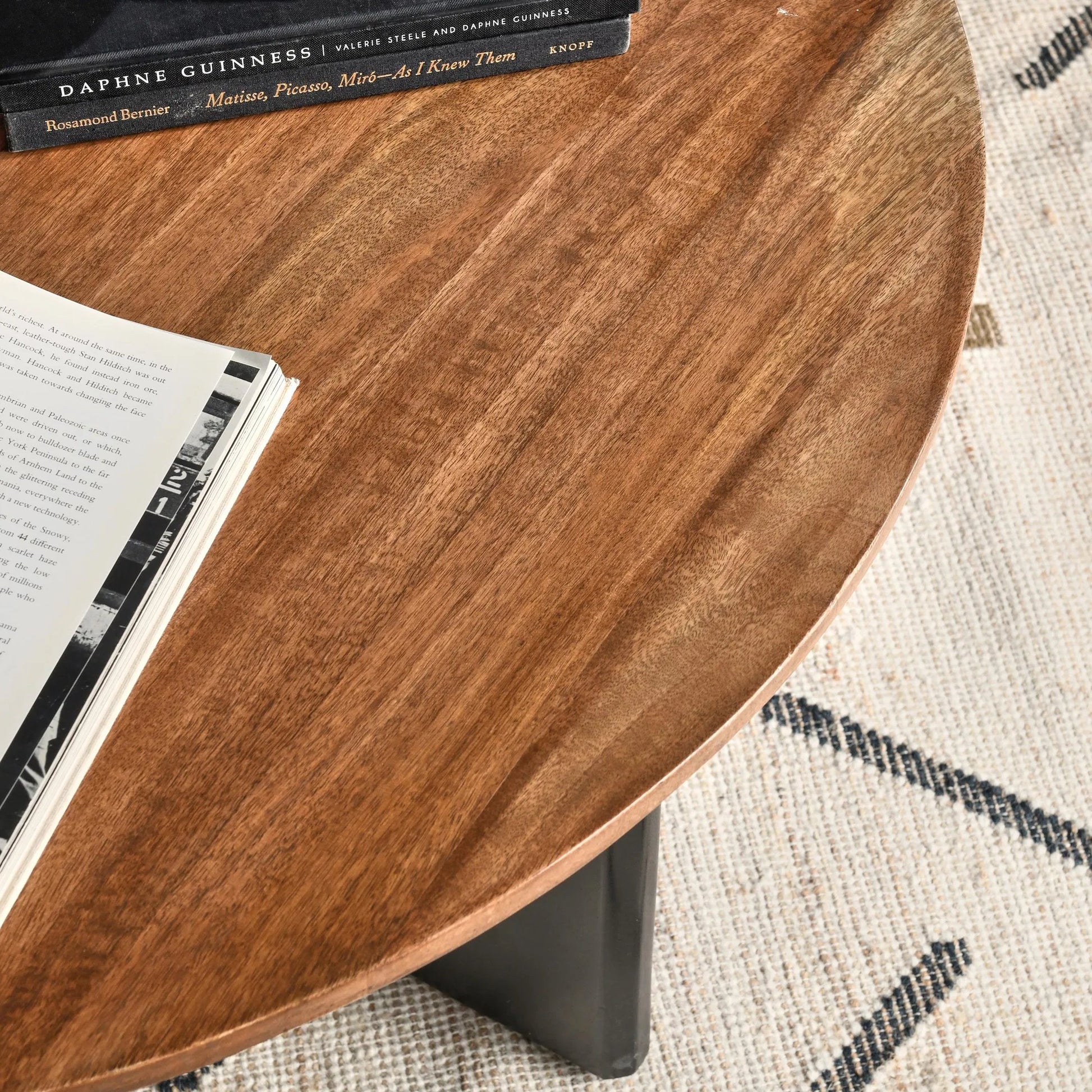 Penelope Mango Wood Two-Tone Coffee Table by Kosas Home in natural brown, black. Made from mango wood in a unique style.