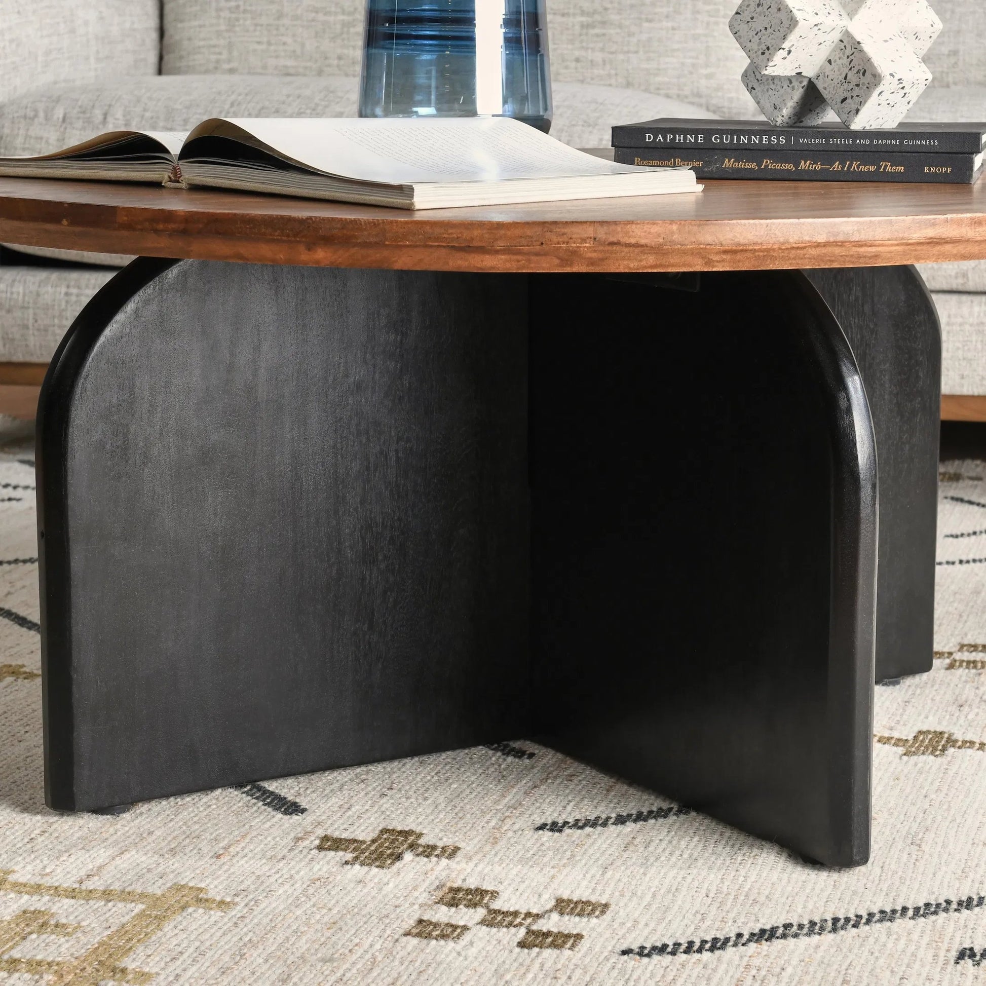 Penelope Mango Wood Two-Tone Coffee Table by Kosas Home in natural brown, black. Made from mango wood in a unique style.