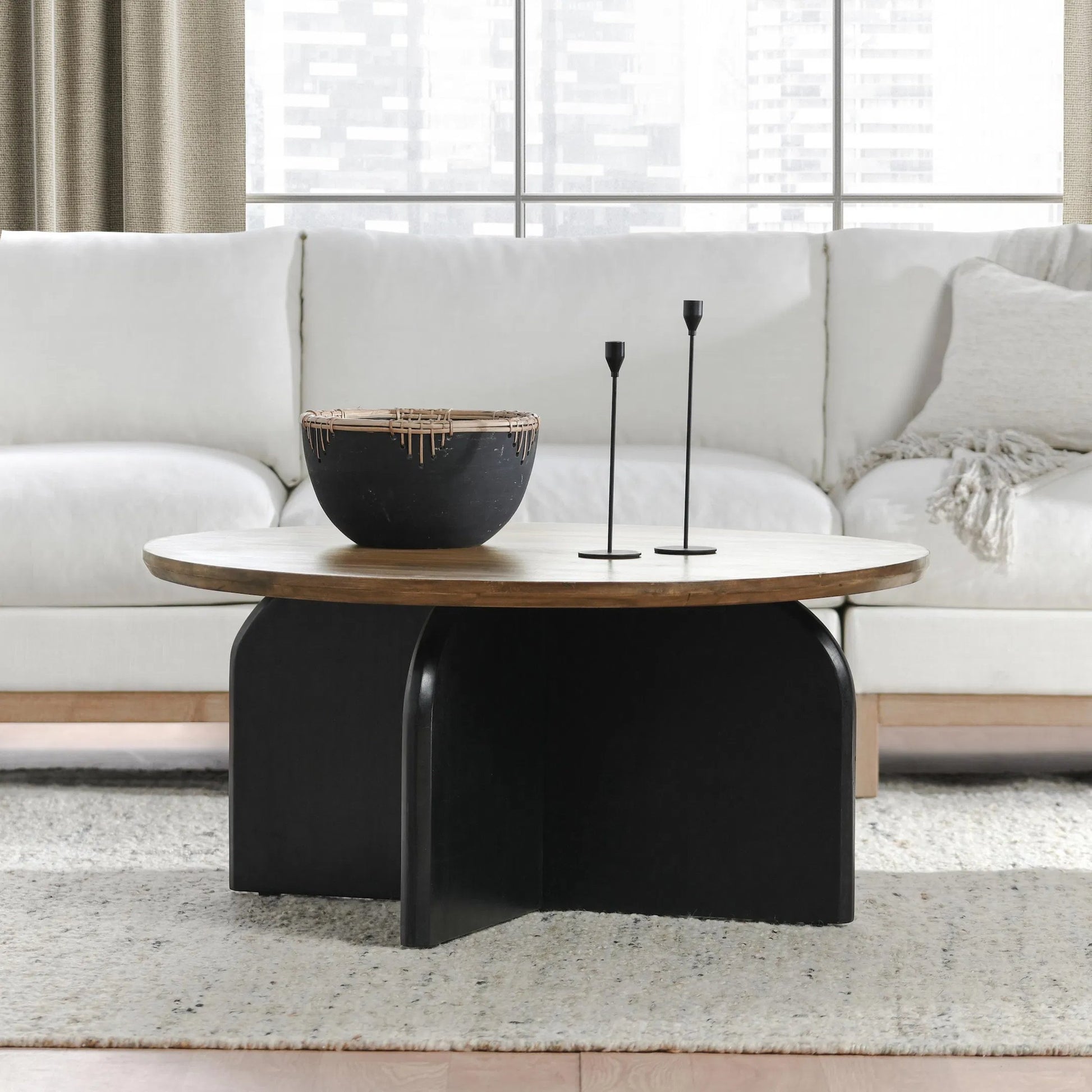 Penelope Mango Wood Two-Tone Coffee Table by Kosas Home in natural brown, black. Made from mango wood in a unique style.