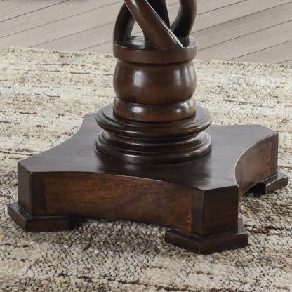 Bella Mango Wood 30" Round Table by Kosas Home in dark brown. Made from mango wood in a unique style.