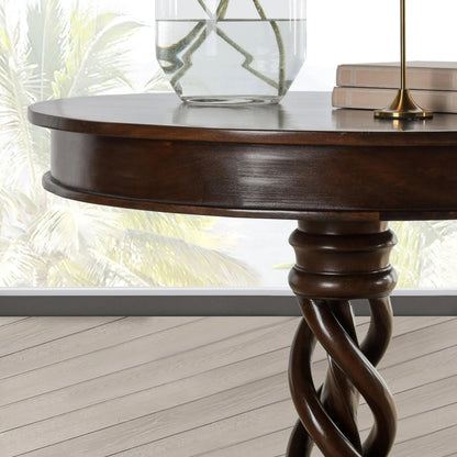 Bella Mango Wood 30" Round Table by Kosas Home in dark brown. Made from mango wood in a unique style.