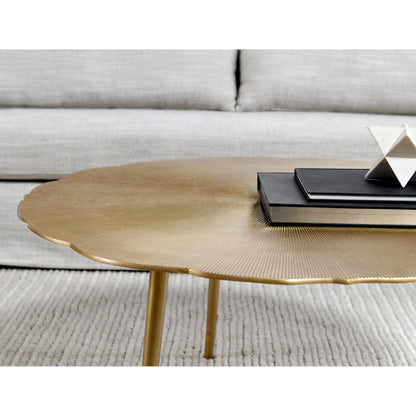 Violetta Coffee Table by Kosas Home in gold. Made from aluminum in a modern style.