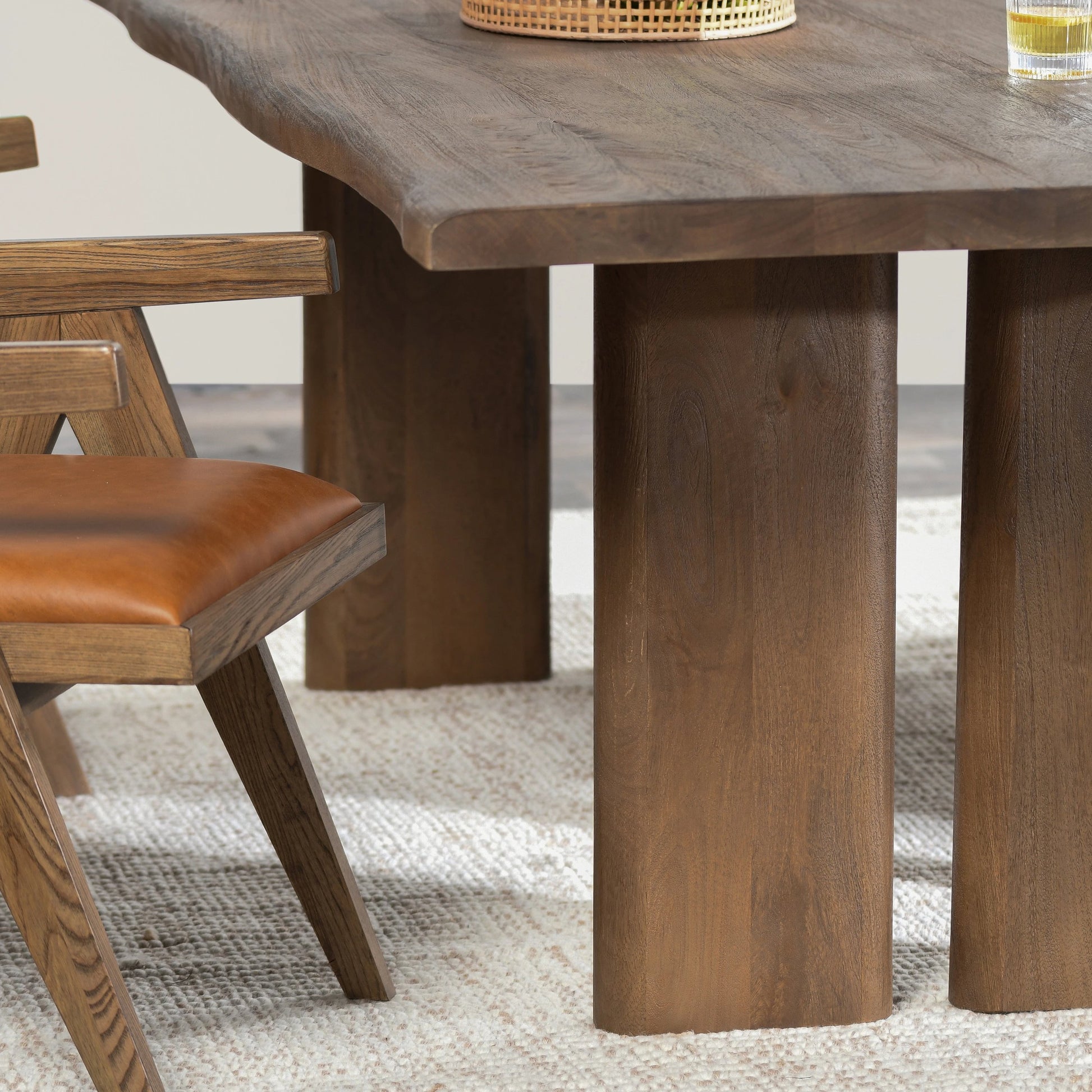 Holmes Mango Wood Dining Table by Classic Home in brown. Made from mango wood in a modern style.