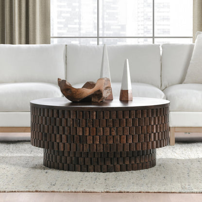 Norwood Round Coffee Table by Classic Home. Made from mango wood in a modern style.