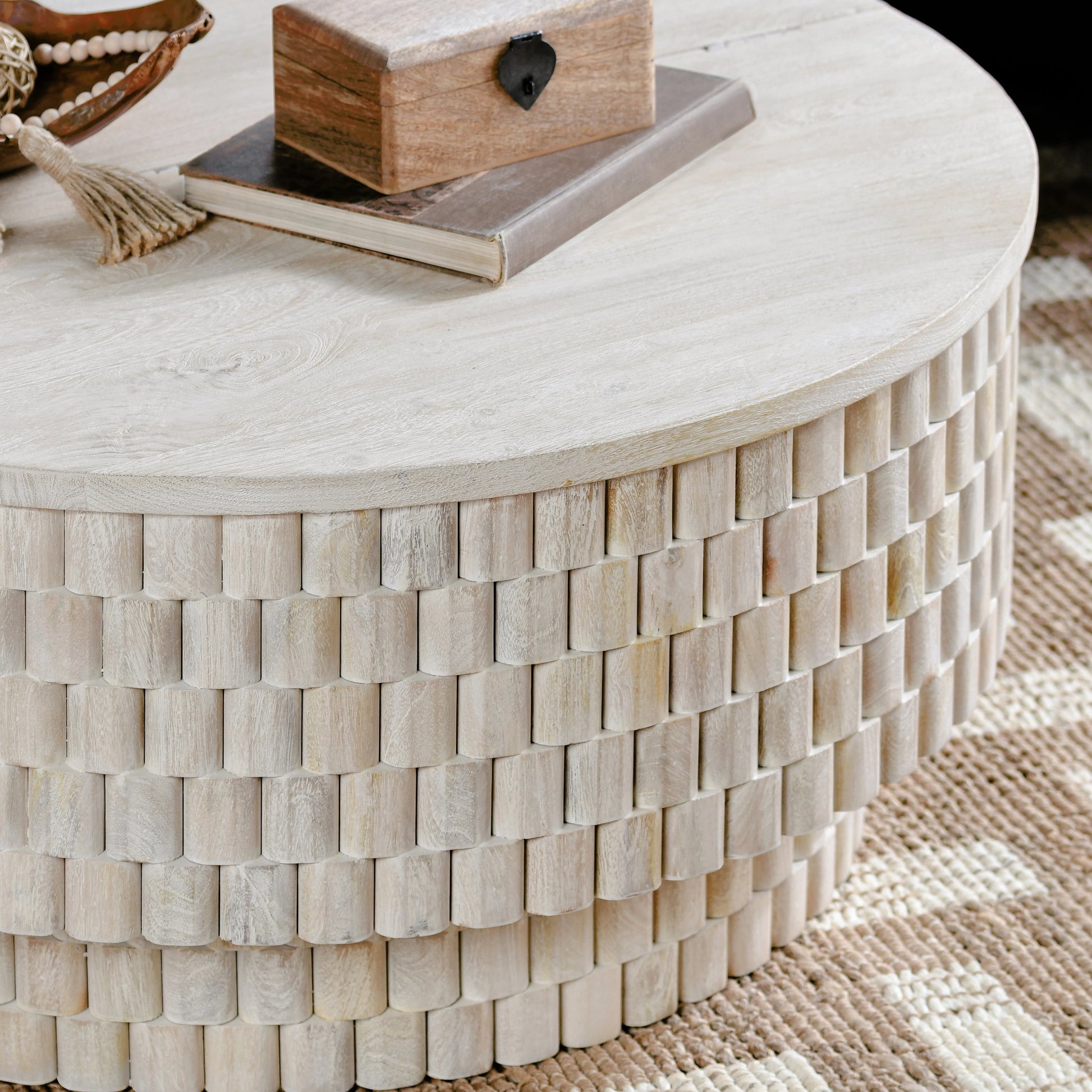 Norwood Round Coffee Table by Classic Home. Made from mango wood in a modern style.
