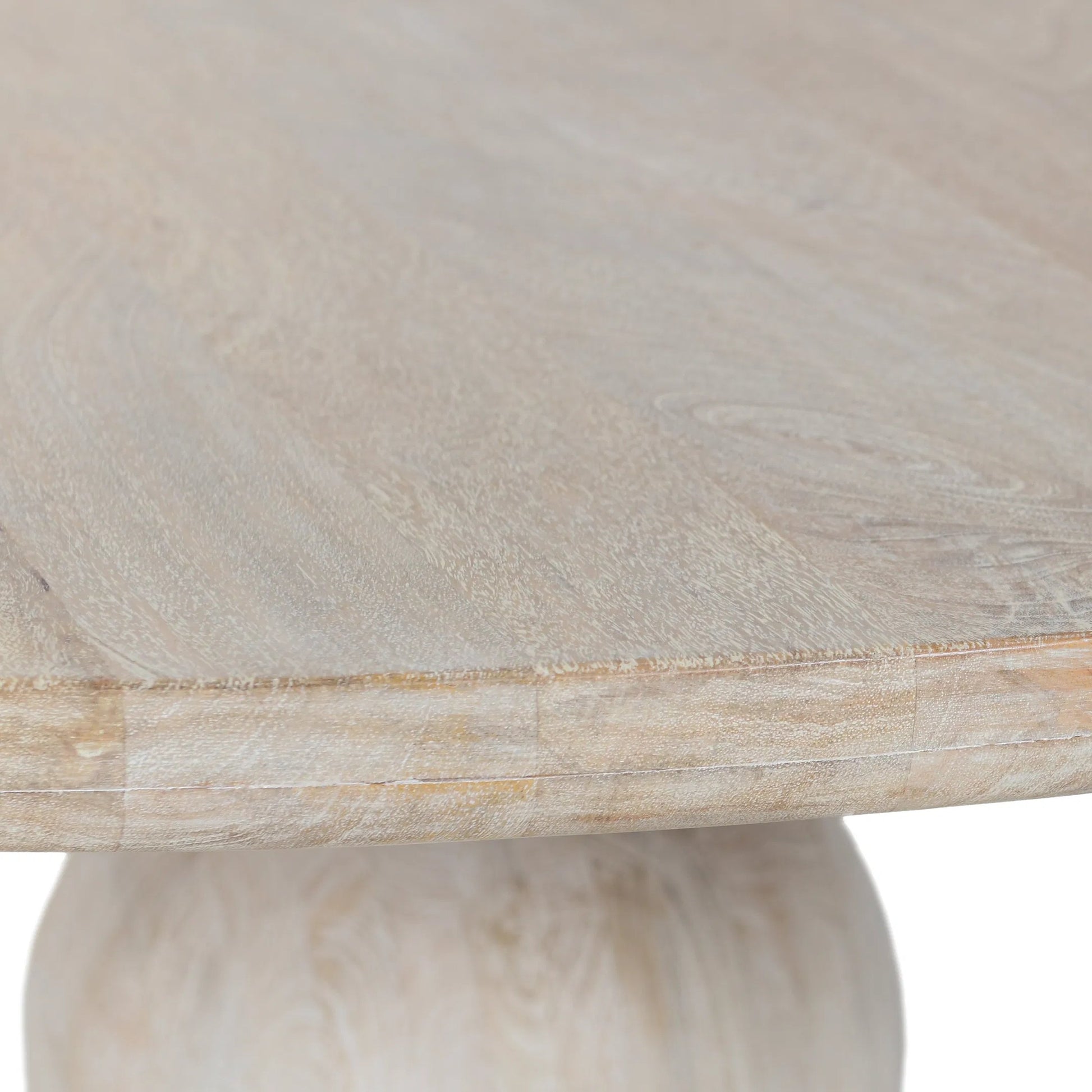 Hera Mango Washed Wood Round Dining Table by Classic Home. Made from mango wood in a unique style.
