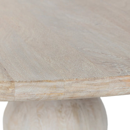 Hera Mango Washed Wood Round Dining Table by Classic Home. Made from mango wood in a unique style.