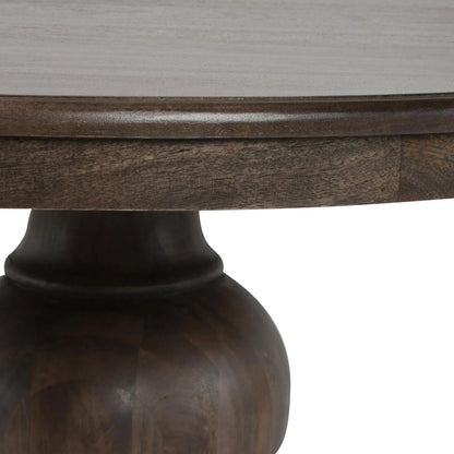 Brookside Round Mango Wood Dinning Table by Classic Home in cocoa brown. Made from mango wood in a traditional style.