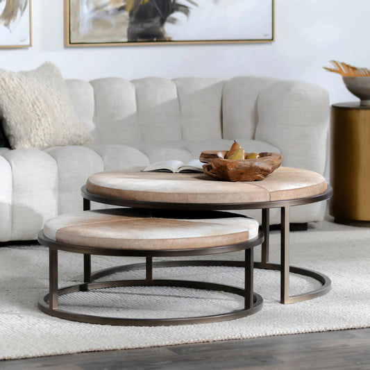 Hayword Hide Nesting Coffee Tables by Classic Home in blonde. Made from iron, hair on hide in a transitional style.