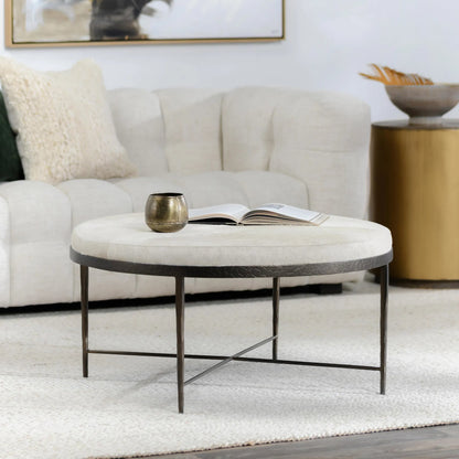 Bose Leather Round Cocktail Coffee Table by Classic Home in ivory. Made from hair on hide, embossed hammered iron in a unique style.