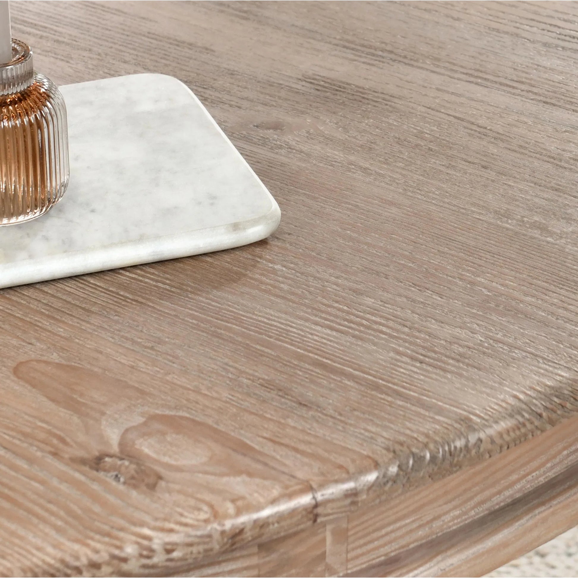 Baldwin 60" Pine Wood Round Dining Table by Kosas Home in taupe. Made from pine wood in a transitional style.