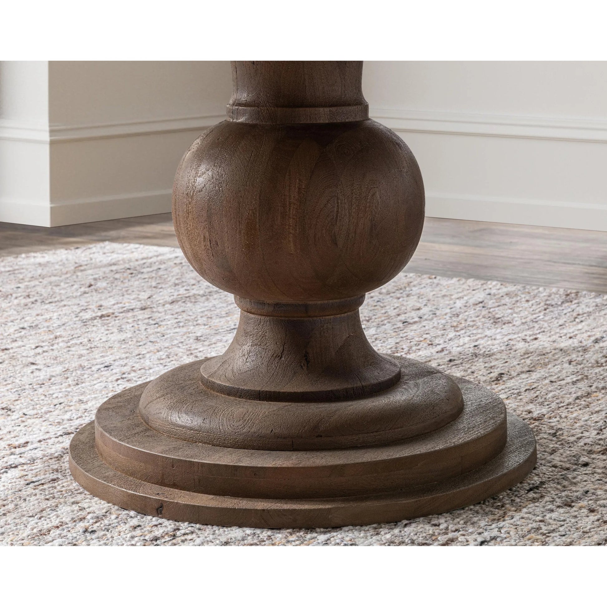 Hera Mango Washed Wood Round Dining Table by Classic Home. Made from mango wood in a unique style.