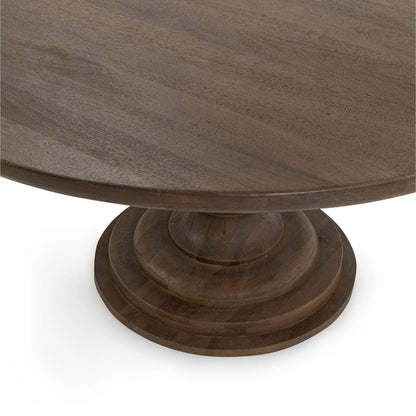 Hera Mango Washed Wood Round Dining Table by Classic Home. Made from mango wood in a unique style.