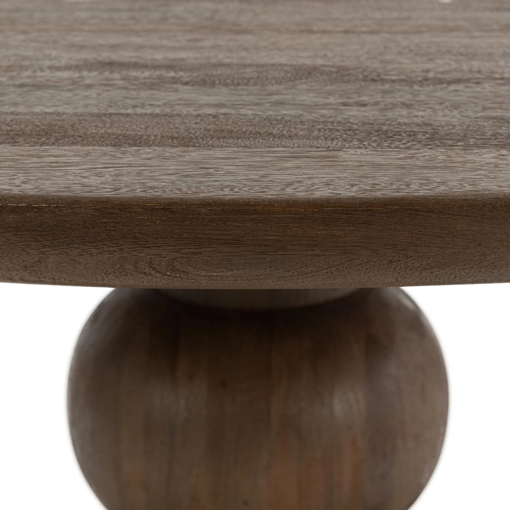 Hera Mango Washed Wood Round Dining Table by Classic Home. Made from mango wood in a unique style.