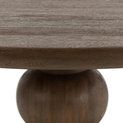 Hera Mango Washed Wood Round Dining Table by Classic Home. Made from mango wood in a unique style.