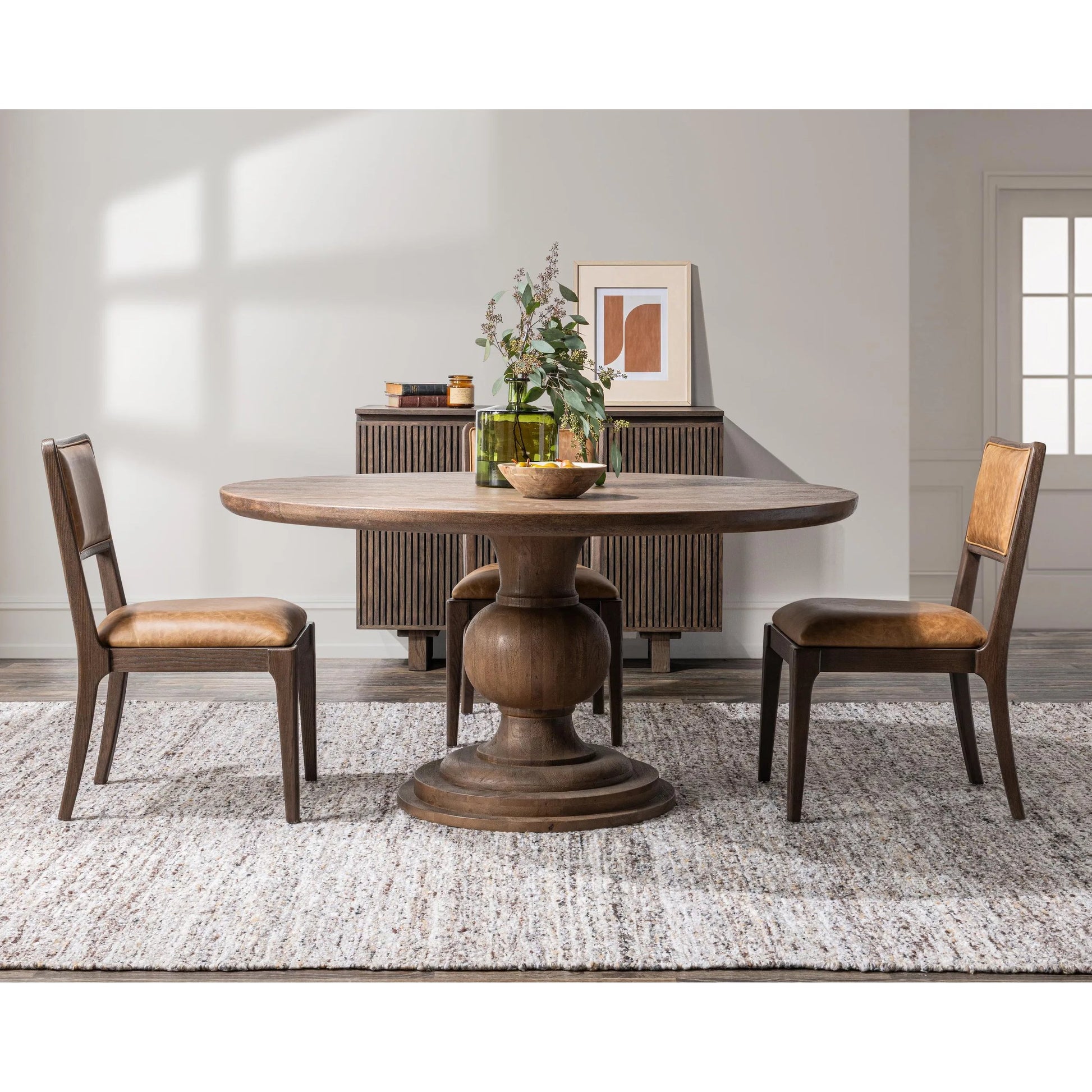 Hera Mango Washed Wood Round Dining Table by Classic Home. Made from mango wood in a unique style.