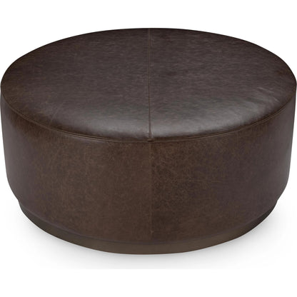 Clair Leather Round Coffee Table by Classic Home in brown, brass. Made from top grain leather in a unique style.